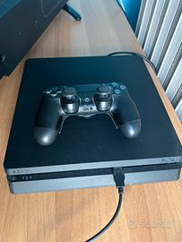Console ps4+controller+aim controller +5 giochi