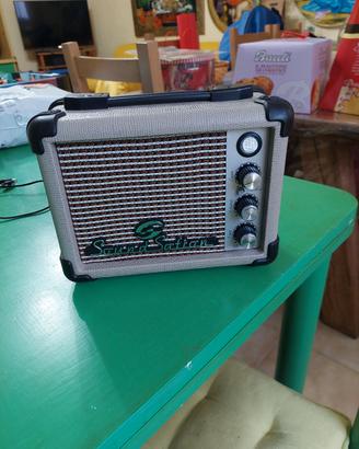 amplificatore elettrico e batteria    chiedo  50 e