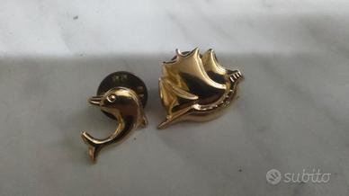 Spille vintage in ottone dorato