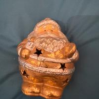 Babbo Natale porta candela