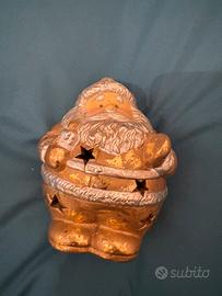 Babbo Natale porta candela