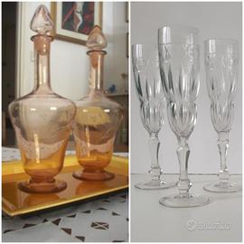 Bottiglie porta liquori  e calici di cristallo 