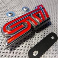 Badge STI griglia frontare Subaru WRX MY09-11
