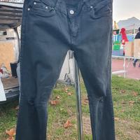 Jeans donna neri skinny strappati 