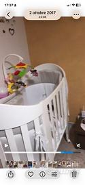 Culla ovale completa di materasso e paracolpi