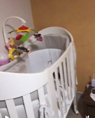 Culla ovale completa di materasso e paracolpi