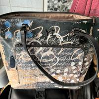 Borsa e portafoglio Y Not