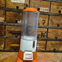 Distributore di caramelle arancio vintage