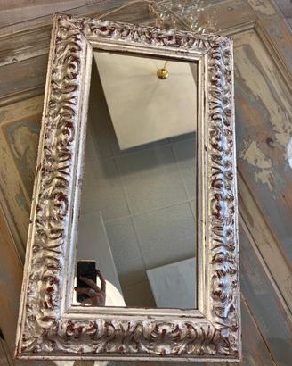 Specchio rettangolare con cornice intagliata