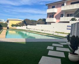 Appartamento Palau in residence con piscina
