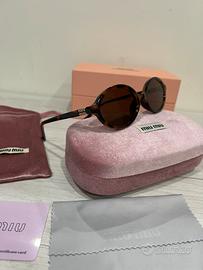 occhiali miu miu da sole