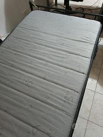 Materasso ortopedico e rete con doghe in legno