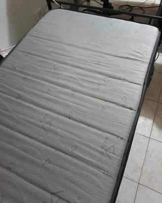 Materasso ortopedico e rete con doghe in legno