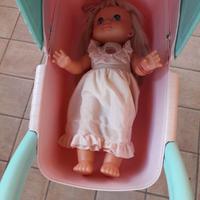 Bambola con carrozzina