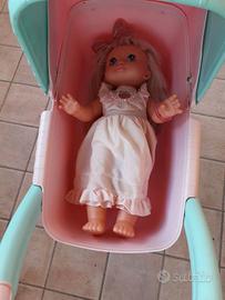 Bambola con carrozzina