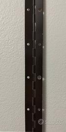 Cerniera a metraggio per porte/ante