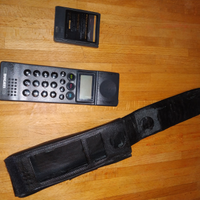 E-tacs portable telephone class 4