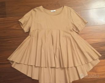 Blusa con accessori collana e orecchini 