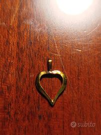 Ciondolo a forma di cuore in argento plac. Oro 24c