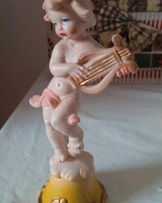 Statuina con angioletto.