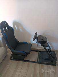 Postazione di guida + volante + gioco
