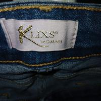 yeans con strappi klixs woman