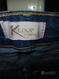 yeans con strappi klixs woman
