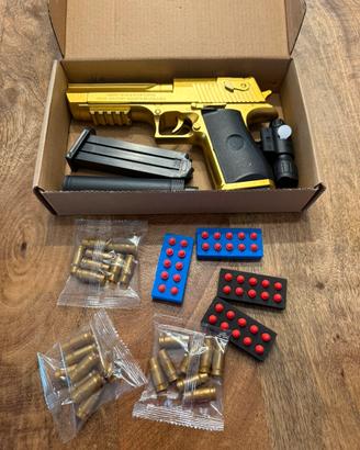 Pistola giocattolo dorata con accessori