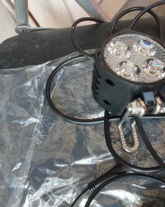 luce anteriore + acceleratore bici o monopattino