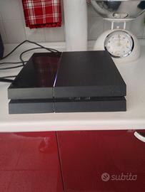 Playstation 4 con giochi e joystick 