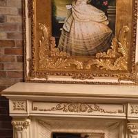 Quadro gigante con luci e camino stufa in legno