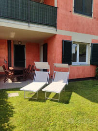 Appartamento con veranda e giardino privato