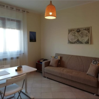 Appartamento con portico e giardino