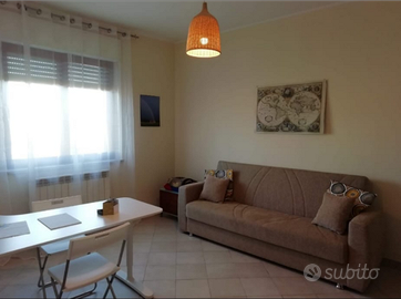 Appartamento con portico e giardino