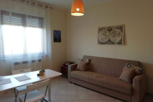 Appartamento con portico e giardino