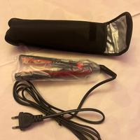 Mini piastra da viaggio rossa -  nuova