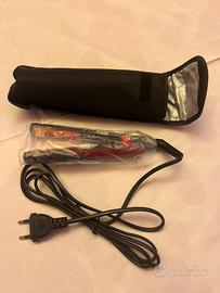 Mini piastra da viaggio rossa -  nuova