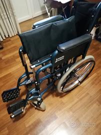 Carrozzina per disabile quasi nuova