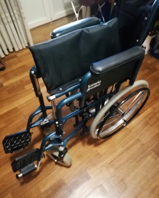 Carrozzina per disabile quasi nuova