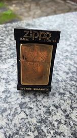 zippo cesellato oro
