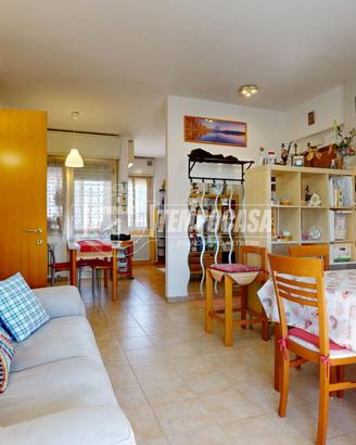 Quadrilocale con due verande e cantina.