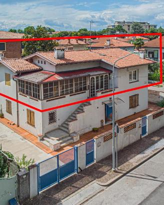 APPARTAMENTO BICAMERE CON GIARDINO IN BIFAMILIARE
