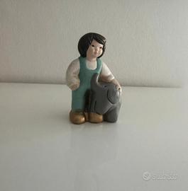 Bimbo thun con elefante