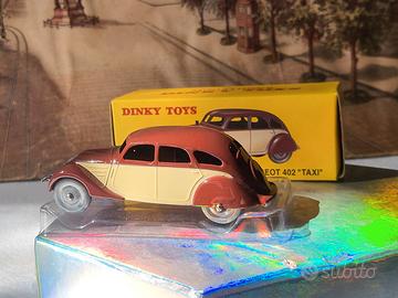 DINKY TOYS PEUGEOT 402 TAXI BICOLORE in scatola 