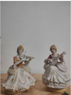 Statuine in Porcella carion