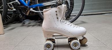 Pattini a rotelle, più sacca ruote