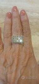 Anello a ponte diamanti naturali e oro