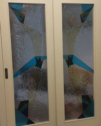 Porta scorrevole a due ante