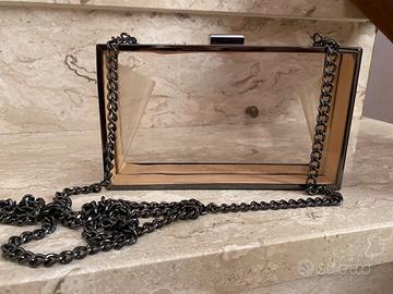 Pochette in vetro e metallo