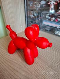 Statuetta palloncino a forma di cane rosso